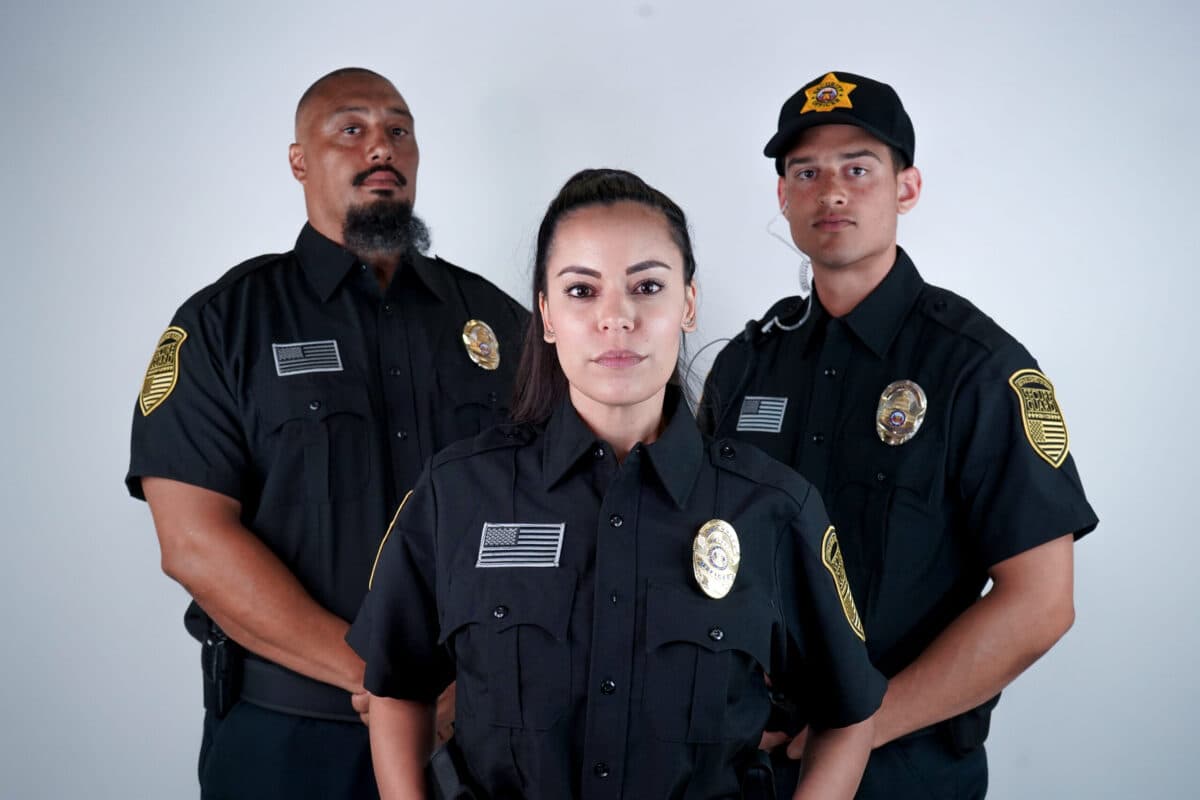 An infographic listing the top benefits of hiring security guards, including crime deterrence, improved safety for employees and customers, quick emergency response, protection of property, and enhanced peace of mind. The image may feature icons or illustrations representing each benefit, such as a shield, surveillance camera, or first-aid symbol.