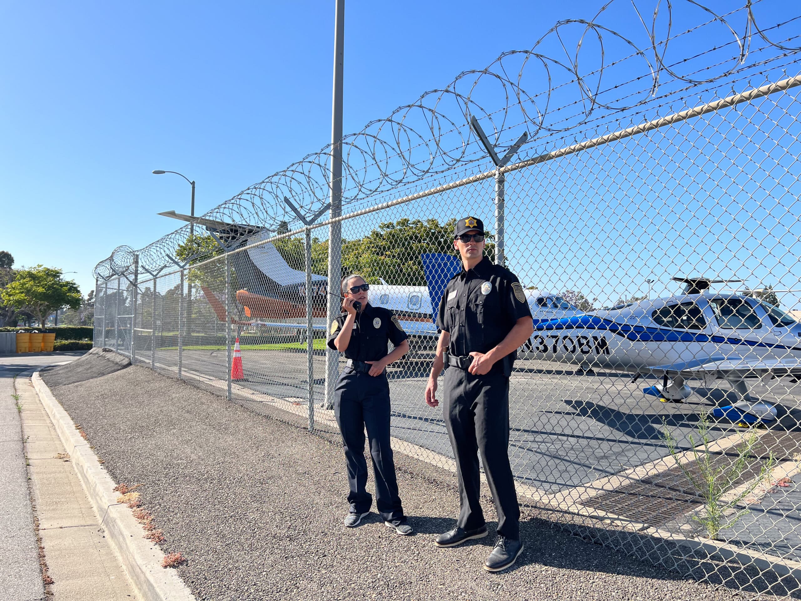 A team of trained security guards conducting a patrol in a commercial area, ensuring safety and deterring threats.