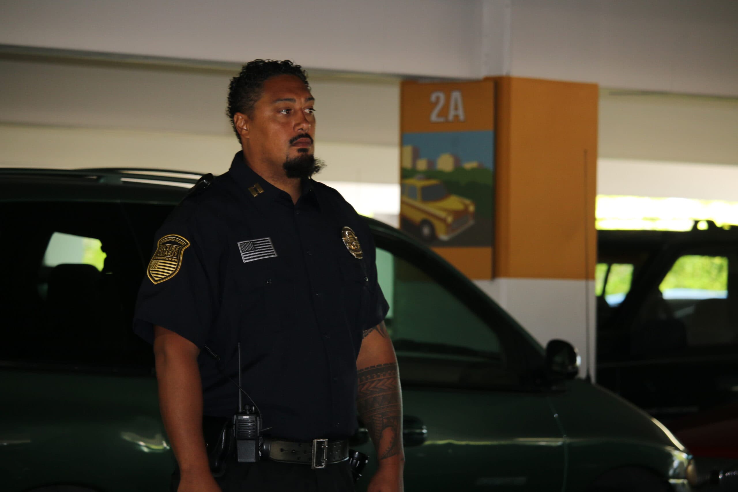 Professional security guard on patrol in Oxnard, providing on-site security services for coastal businesses and commercial properties.